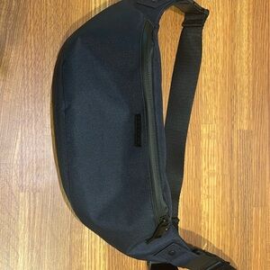 Fanny pack - new! Navy. Zippered pocket inside and 2 mesh pockets. Holds a lot!